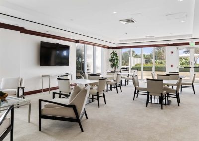 lambiance beach condo event sitting area with tables